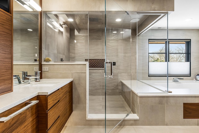 6505 N Knox Ave, Lincolnwood, IL 60645 - full bathroom featuring a stall shower, a garden tub, and vanity