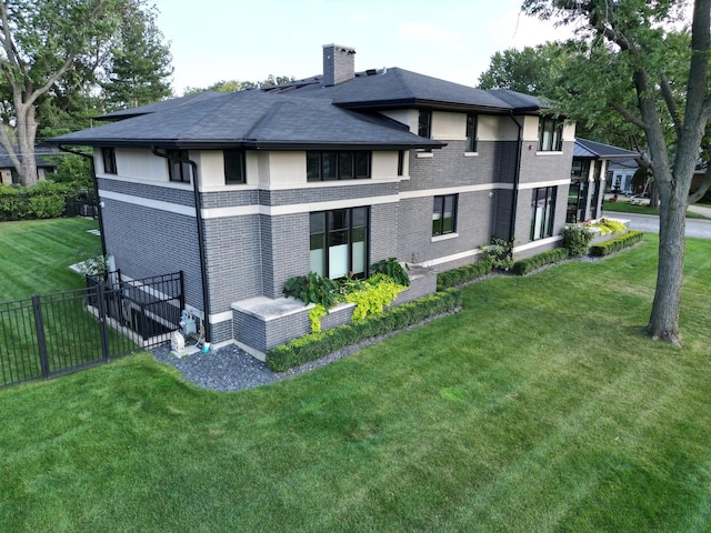 6505 N Knox Ave, Lincolnwood, IL 60645 - rear view of house with a yard, a chimney, and fence