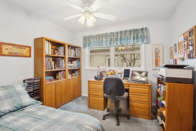 bedroom featuring ceiling fan and light carpet