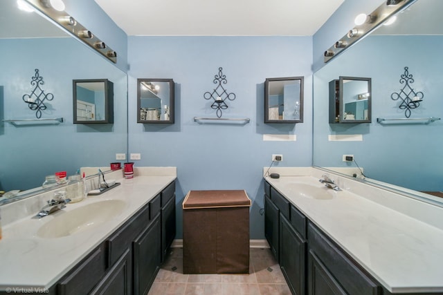 bathroom with vanity and tile patterned floors