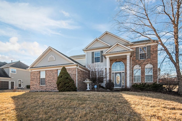 view of property with a front lawn