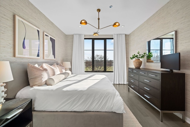 bedroom with dark wood-style floors