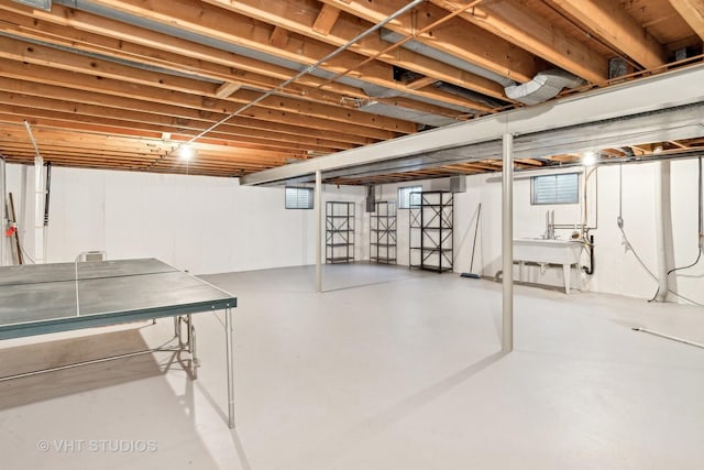 basement featuring a sink