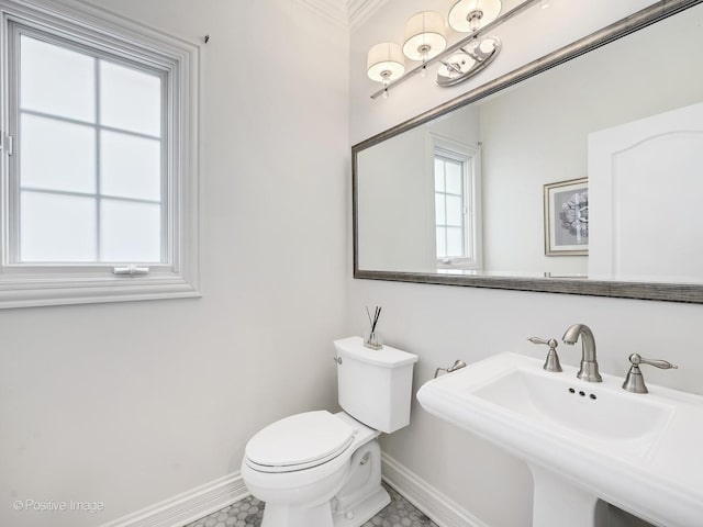 bathroom with sink and toilet