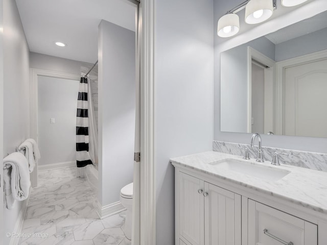 full bathroom featuring vanity, shower / tub combo, and toilet