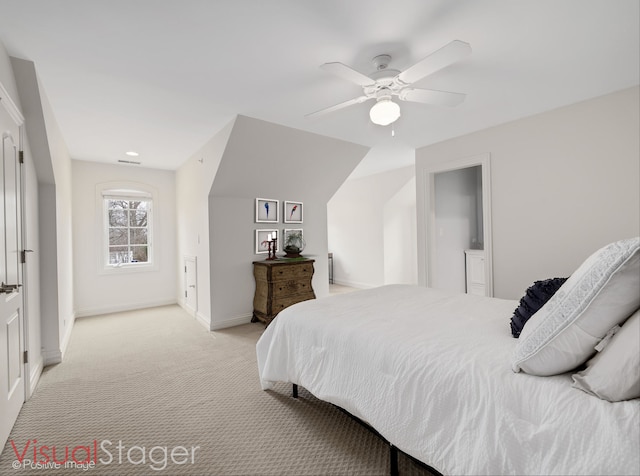 bedroom featuring ceiling fan and light colored carpet