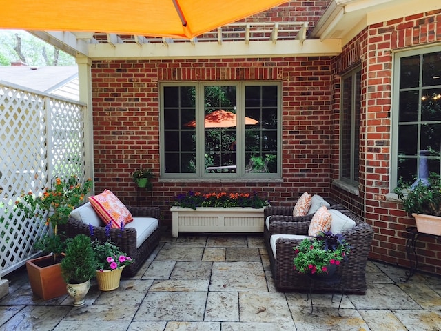 view of patio / terrace featuring radiator and an outdoor hangout area