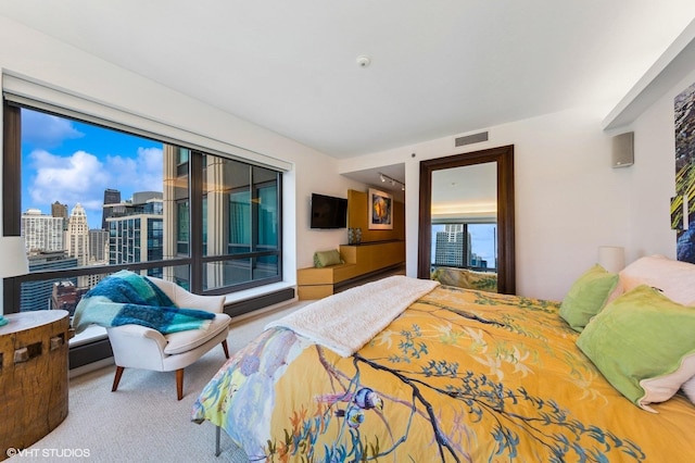 130 N Garland Ct Unit 4101, Chicago, IL 60602 - bedroom with carpet floors, visible vents, and a city view