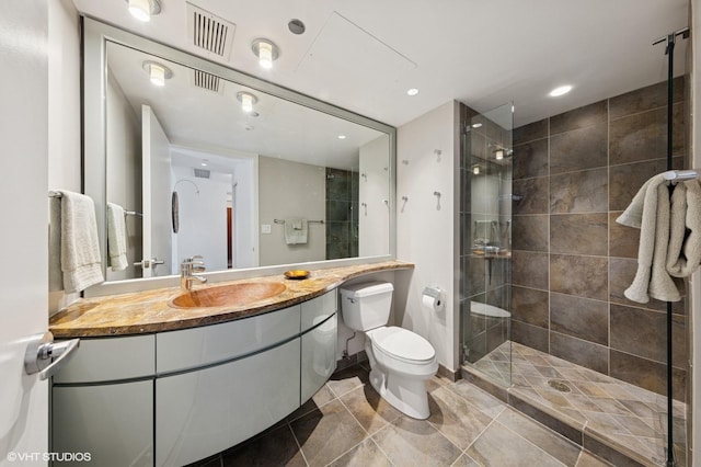 130 N Garland Ct Unit 4101, Chicago, IL 60602 - full bath with toilet, visible vents, tiled shower, and vanity