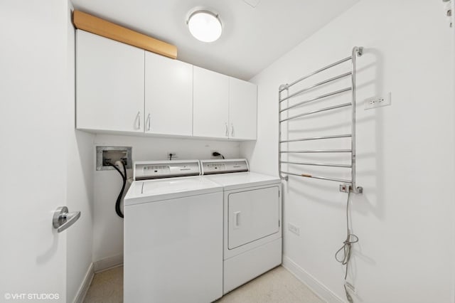130 N Garland Ct Unit 4101, Chicago, IL 60602 - laundry area featuring cabinet space, baseboards, and washing machine and clothes dryer