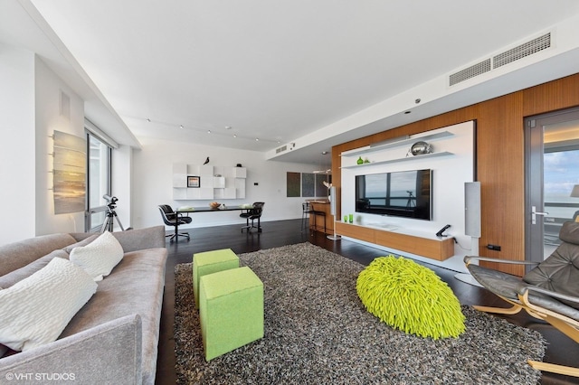 130 N Garland Ct Unit 4101, Chicago, IL 60602 - living area with visible vents, plenty of natural light, and wood finished floors