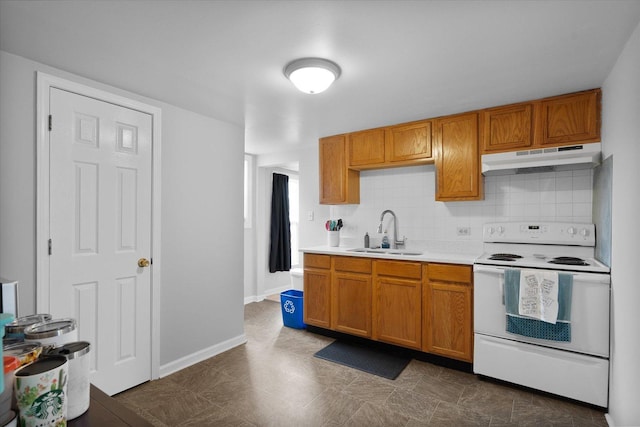 kitchen with tasteful backsplash, sink, and electric range