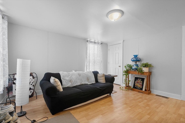 living room with hardwood / wood-style flooring