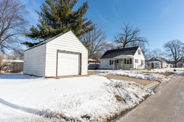 exterior space with a detached garage