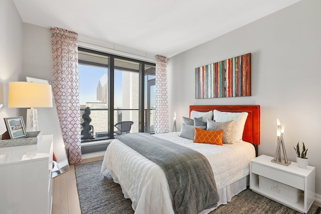 bedroom featuring dark hardwood / wood-style floors