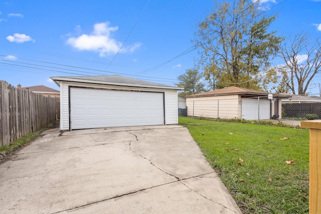 garage with a lawn