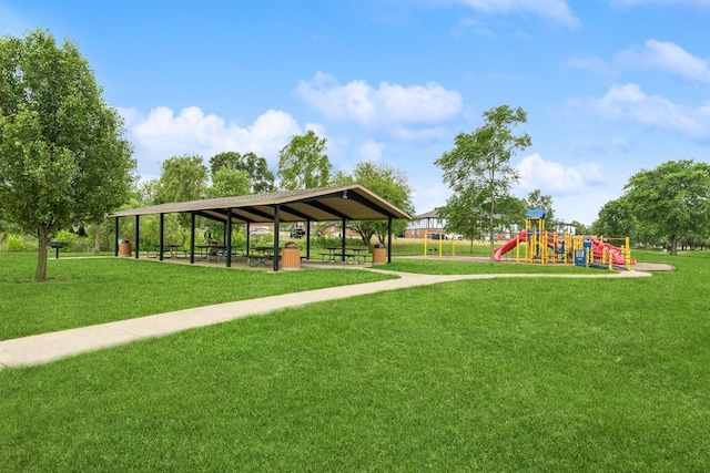 view of community with a playground and a lawn