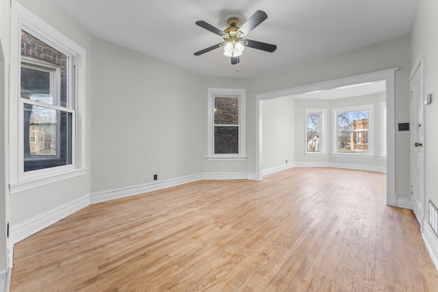 interior space with ceiling fan and light wood-type flooring