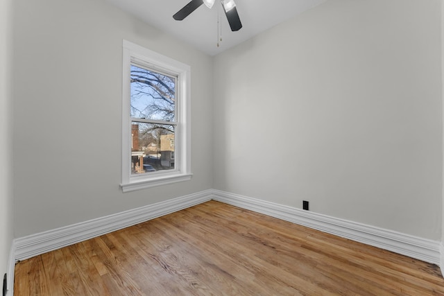 unfurnished room with light hardwood / wood-style flooring and ceiling fan