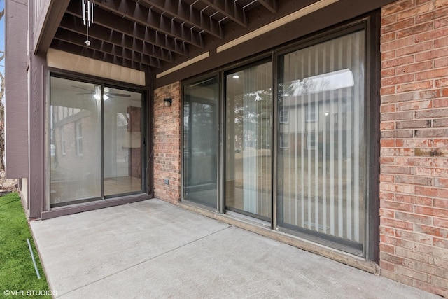 property entrance featuring a patio