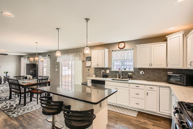 kitchen with white cabinets, stainless steel appliances, and sink