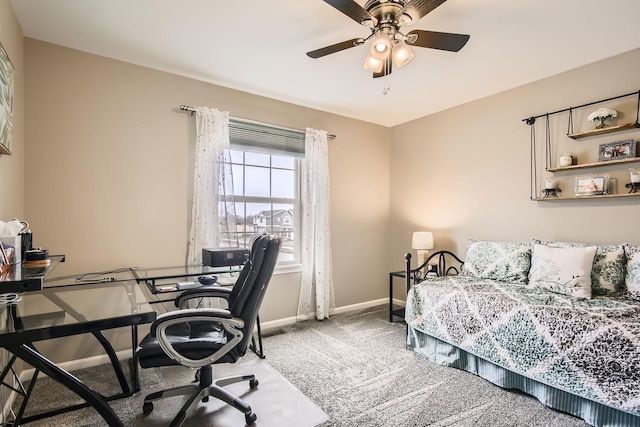 bedroom with ceiling fan and carpet floors