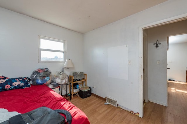 bedroom featuring light hardwood / wood-style flooring