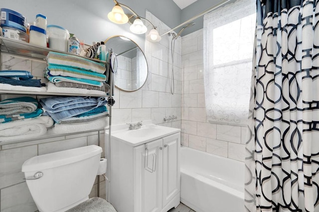full bath featuring vanity, toilet, shower / tub combo with curtain, tile walls, and backsplash