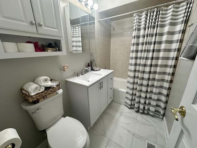 full bathroom with shower / bath combination with curtain, vanity, and toilet