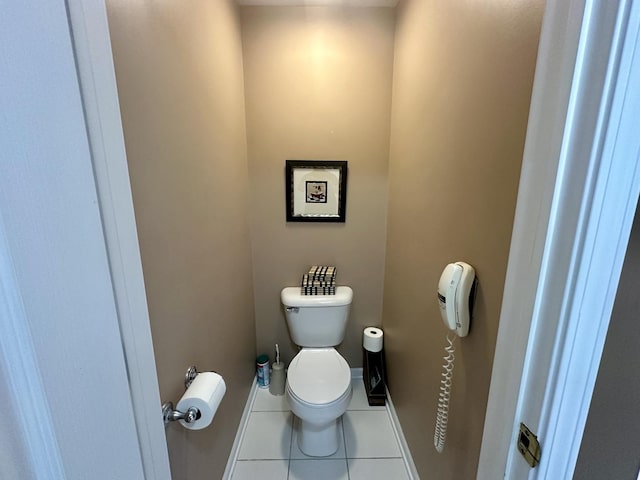 bathroom featuring tile patterned floors and toilet