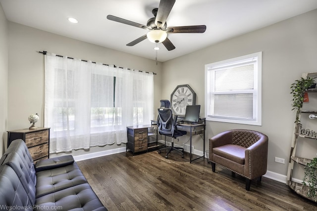 office space featuring dark wood-type flooring and ceiling fan