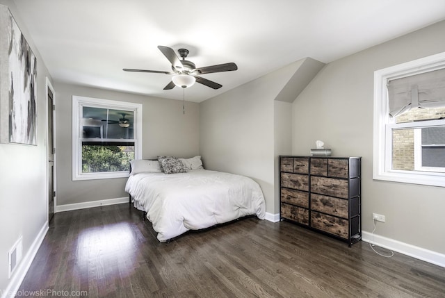 bedroom featuring dark hardwood / wood-style flooring and ceiling fan