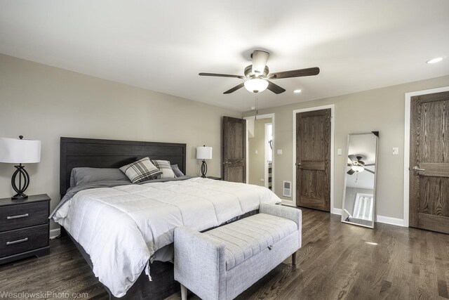 bedroom featuring dark wood-type flooring and ceiling fan