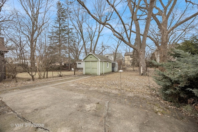 view of front of house with a storage shed