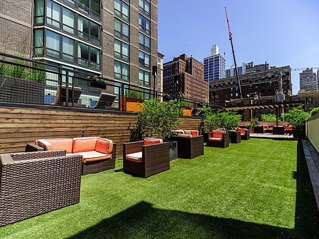 view of yard with outdoor lounge area and a pergola