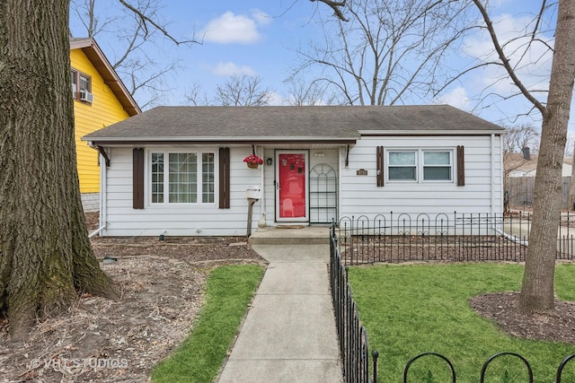 view of front facade featuring a front yard