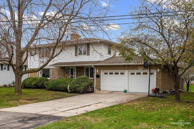 view of front of property featuring a garage and a front yard