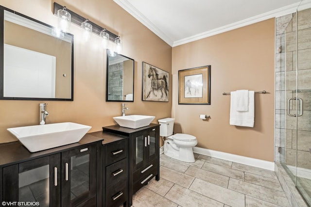 bathroom featuring walk in shower, toilet, crown molding, vanity, and tile patterned flooring