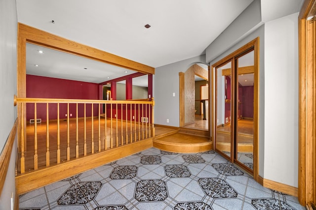 hallway with beam ceiling