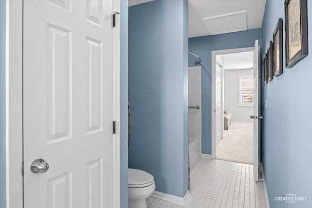 bathroom with baseboards, tub / shower combination, toilet, and tile patterned floors