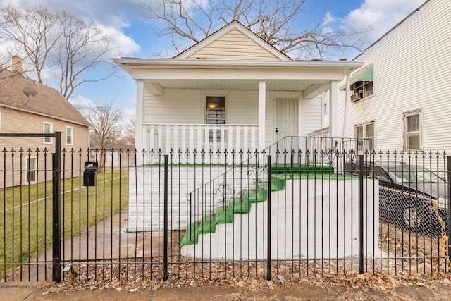 exterior space with a front yard and covered porch