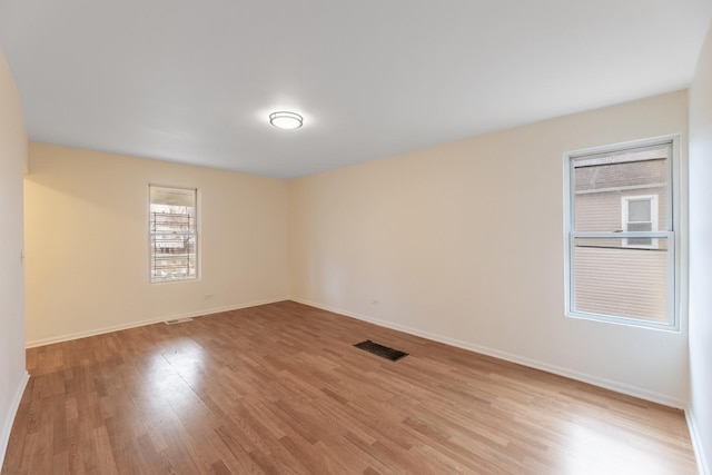 empty room with light wood-type flooring