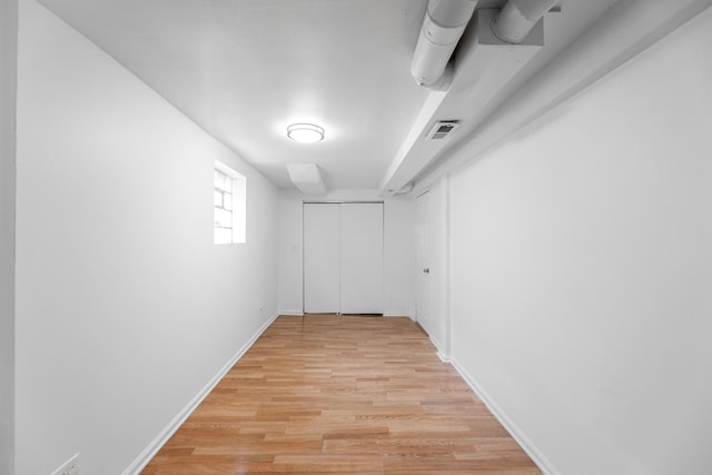 corridor featuring light wood-type flooring