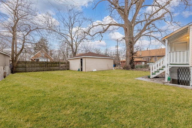 view of yard featuring a storage unit