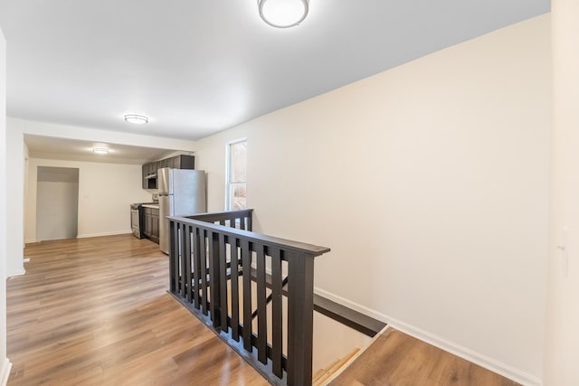 hallway with light wood-type flooring