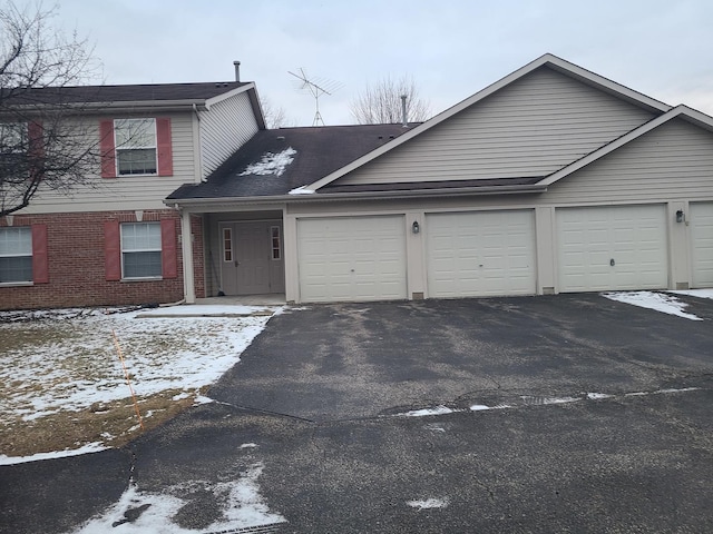 front of property with a garage