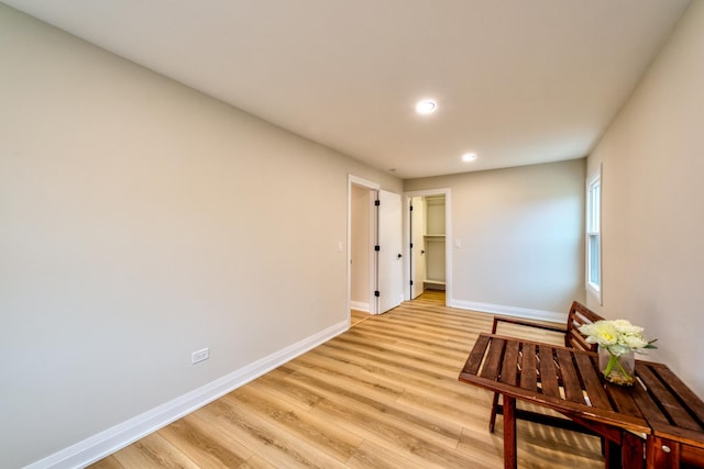 hallway featuring light wood-type flooring