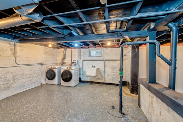 basement featuring separate washer and dryer