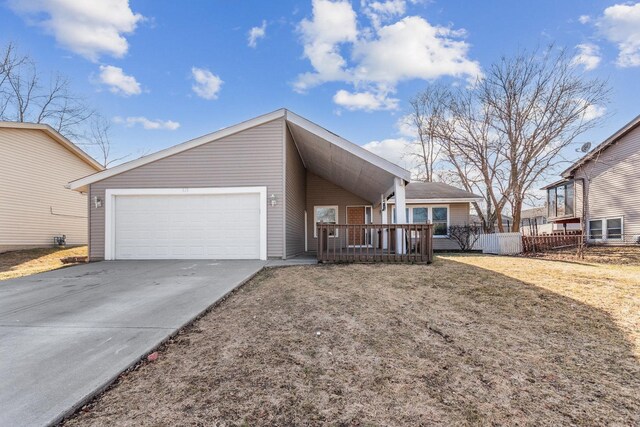 view of front of property with a garage and covered porch