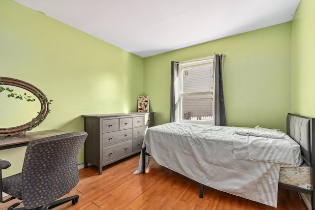 bedroom with light wood-type flooring